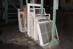 Approximately 25 Assortment of Windows and Frames