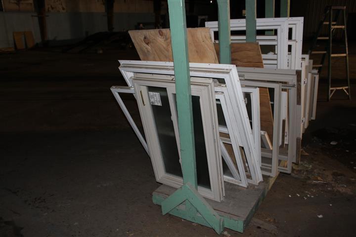 Approximately 25 Assortment of Windows and Frames