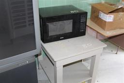 Philips Large Screen TV, Kenmore Microwave, and Desk