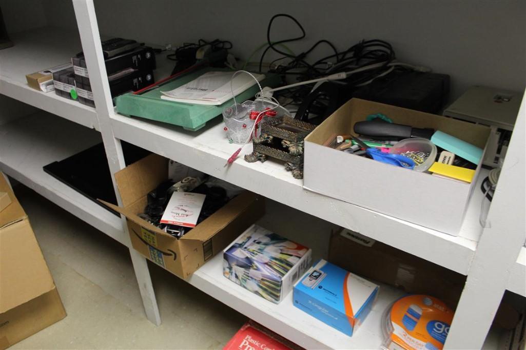 Content of Shelves such as office supplies, time clock, radio w/speakers, binders, staplers, staples