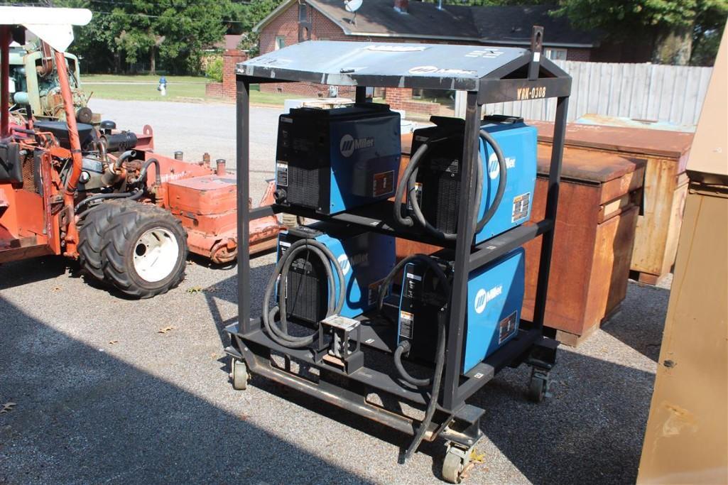 MILLER ELECTRIC 4 BANK WELDERS ON ROLL AROUND SKID S#'S LG430350A, LH040235A, LH370075A,