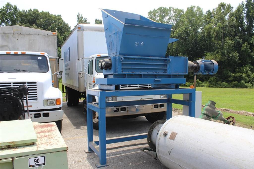 SSI M55E ELECTRIC POWERED SHREDDER ON STAND.