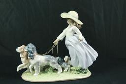Girl Walking Dogs Lladro Figurine