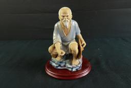 Asian Fisherman Statue