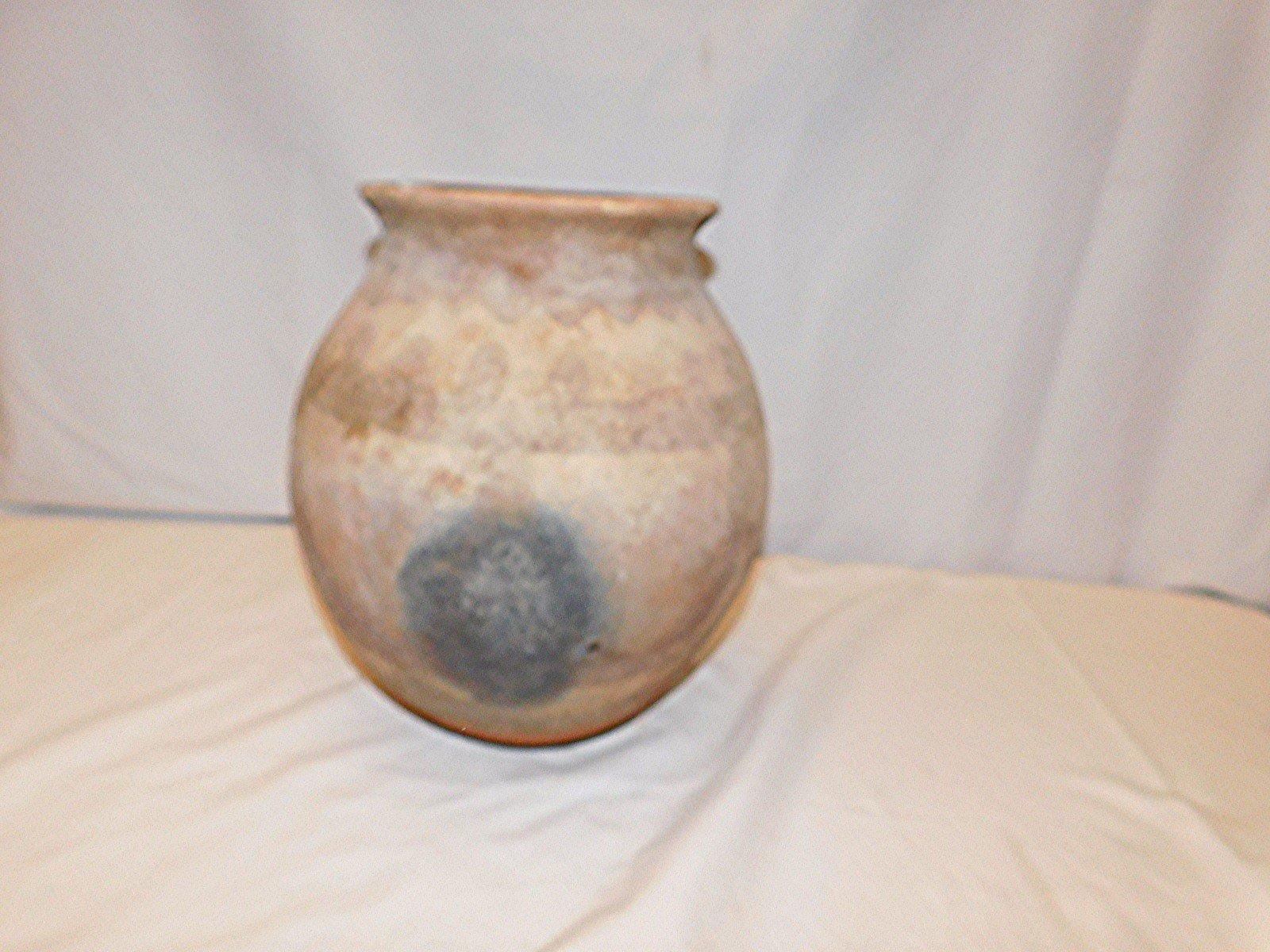 LARGE POTTERY VASE WITH CIRCLE DISCOLORATION ON BACK SHIPS ON LIP AS SHOWN