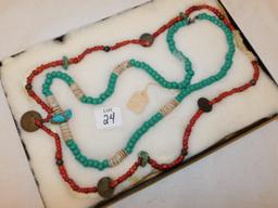 TRADE BEADS 2 SETS IN A CASE, ORANGE BEADS WITH COINS DATED 1890 & 1906, TU