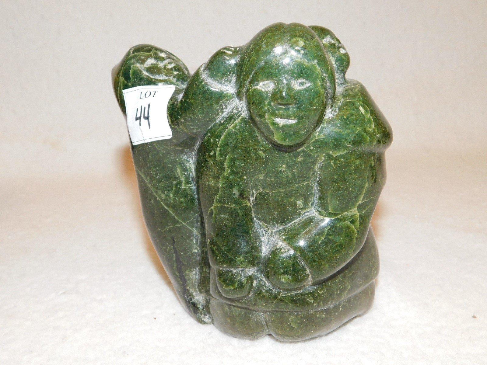 ESKIMOS CARVING, BELIEVED TO BE MADE OUT OF JADE, MEASURES 6" TALL X 5.5" W