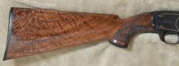 WINCHESTER MODEL 42, ENGRAVED AND GOLD INLAID ALONG WITH GOLD WIRE SOLID RIB 26" BARREL, FULL CHOKE.