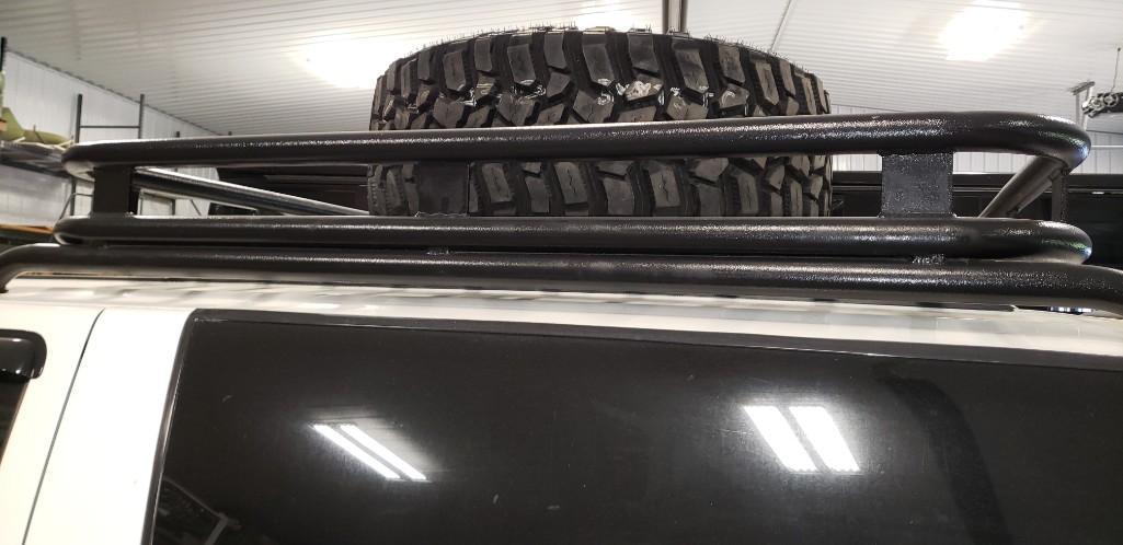 1995 Chevrolet Suburban 4x4, 350 V8, lifted, new 37X13.50R20LT tires on Fuel rims, white/blacked