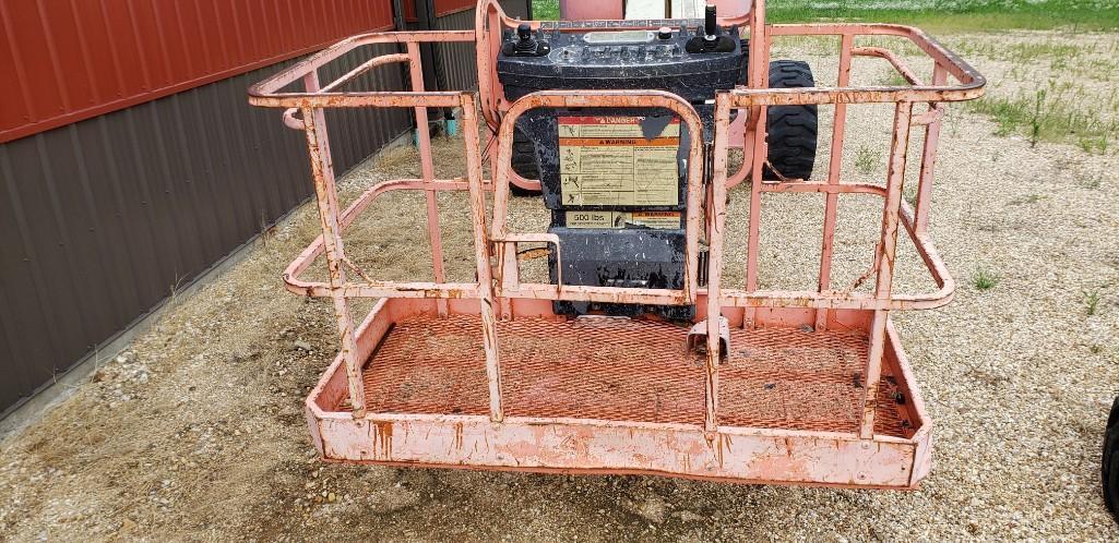 1998 JLG 600S 60' Basket Lift, Gas/Propane. Runs great. Gasoline tank needs cleaned. Is currently