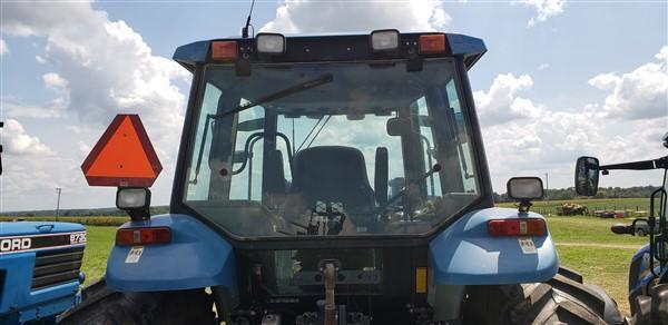 2000 -New Holland TM125 MFWD, 72LA Loader, 2323 hr., Fenders, 4 SCVs, Shuttle Shift, Left hand