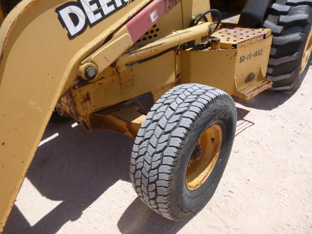 John Deere 210LE Skip Loader