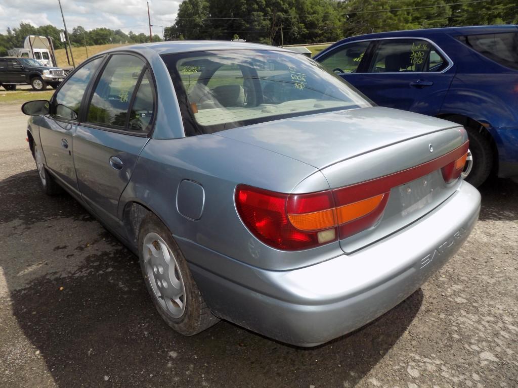 '02 Saturn S-Series, 4-Door, Light Blue, Auto, 90,613 Miles, Needs Exhaust