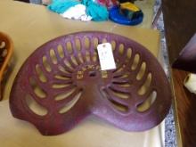 Cast Iron ''Champion'' Tractor Seat, Maroon and Yellow, (In Equipment Shed)
