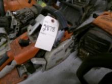 Large Group of Chain Saw Parts and Powerheads and an Evinrude Fastwin 18 HP