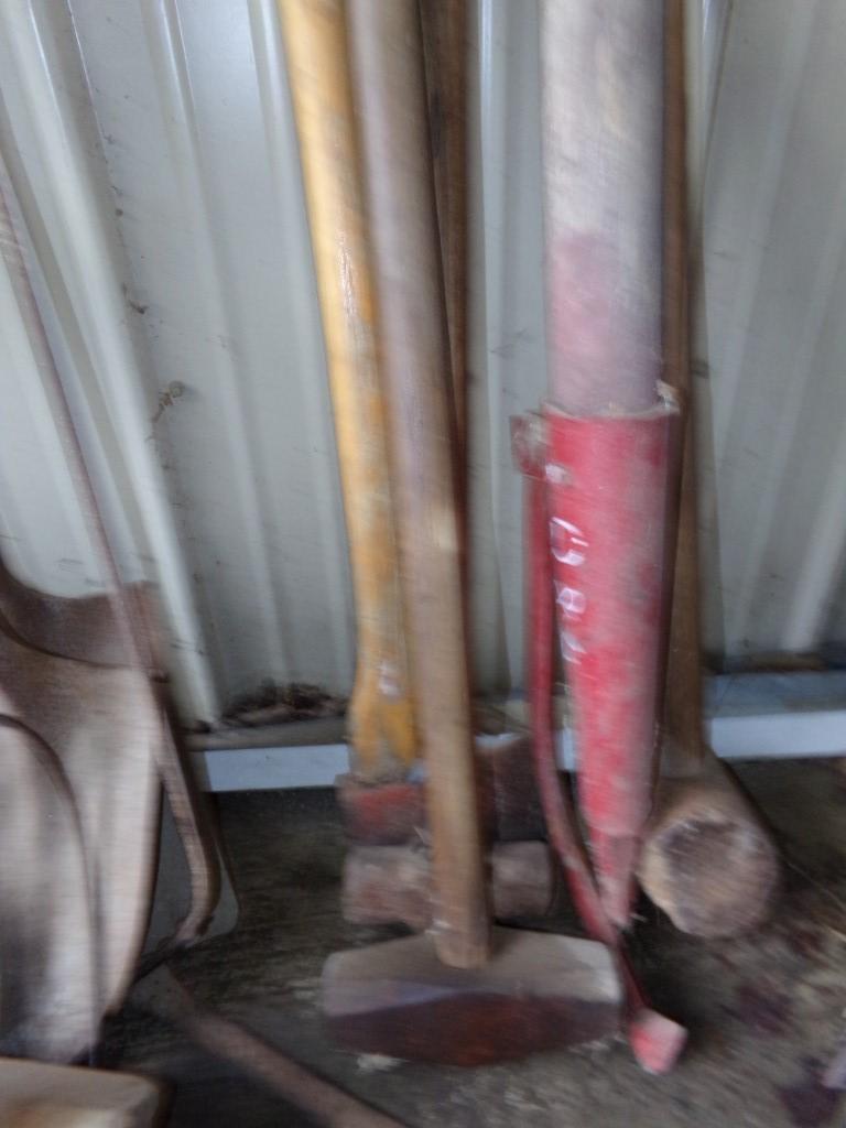 (2) Sledge Hammers and an Axe (Lean to Side of Garage)