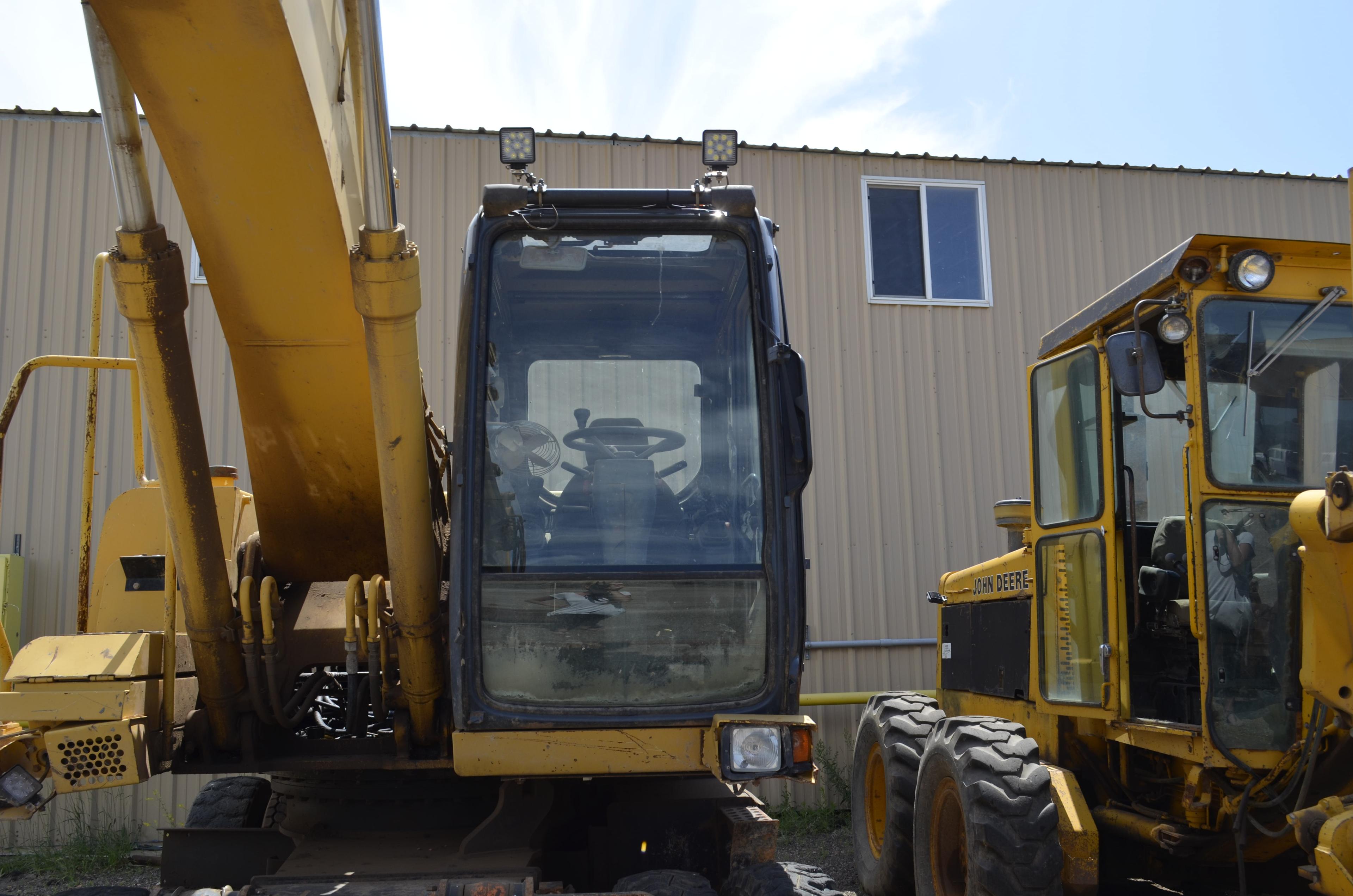 2005 John Deere 210 CW 4x4 Mobile Excavator