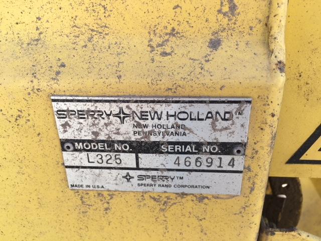 1978 New Holland L325 g. skidloader S.#466914 w/material & tine buckets, 2,862 hrs.