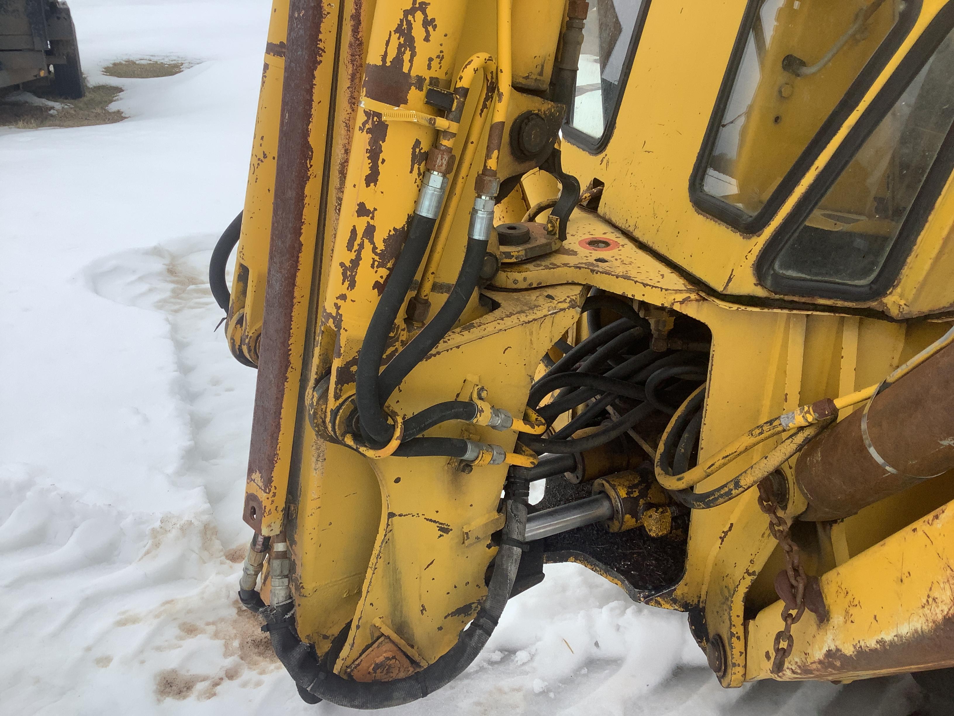 Case 680E Backhoe