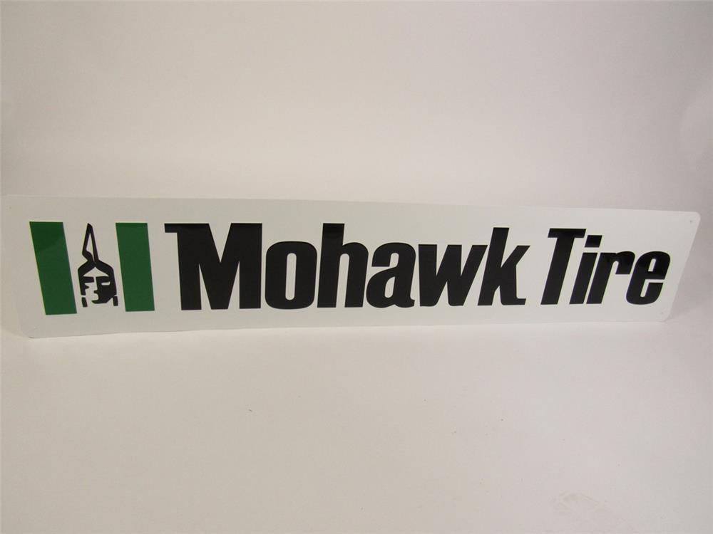 Choice NOS vintage Mohawk Tire single-sided embossed tin sign with Mohawk brave logo.