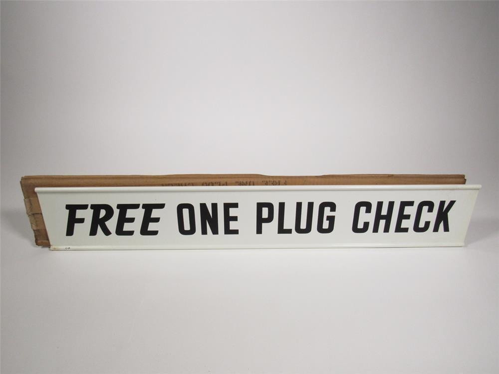 Very nice NOS 1950s Champion Spark Plugs Free One Plug Check double-sided tin service station sign.