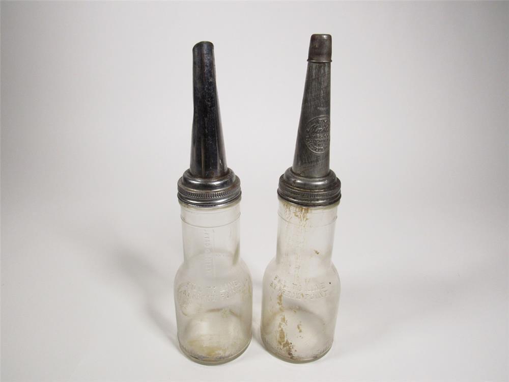 Lot of two circa 1920s-30s Shields and Harper embossed glass filling station oil bottles with metal 