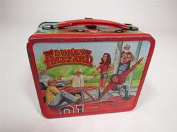 Highly collectible 1980 The Dukes of Hazzard metal lunch box with killer graphics.