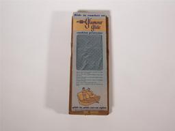 NOS 1950s Chevrolet Glamour Glide Cushion Protector still in the original box.