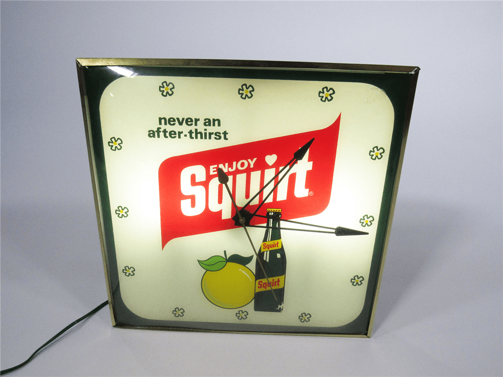 CIRCA 1960S SQUIRT LIGHT-UP DINER CLOCK