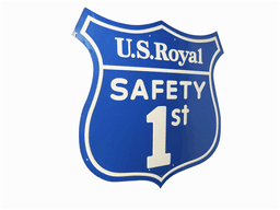 1958 U.S. ROYAL TIRES EMBOSSED TIN SIGN