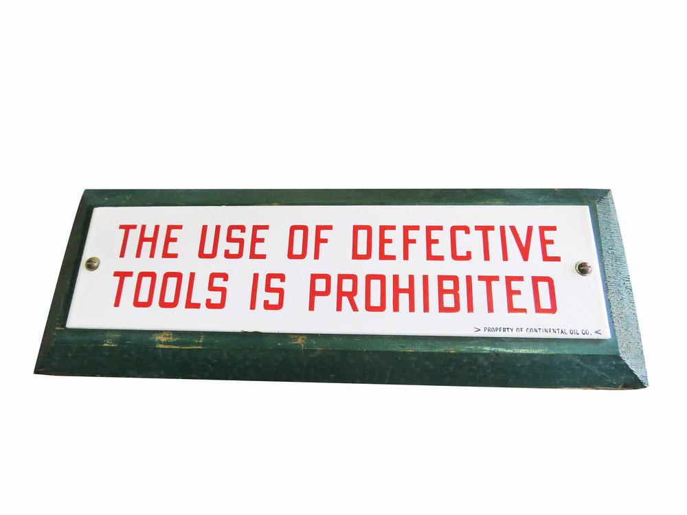 1940S CONOCO "USE OF DEFECTIVE TOOLS IS PROHIBITED" PORCELAIN SIGN