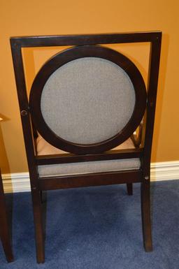 PAIR OF DARK BROWN WOOD ARM CHAIRS WITH TAN