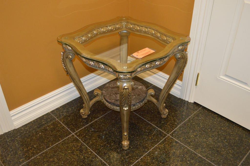 PAIR OF ORNATE GILT END TABLES WITH GLASS TOPS,