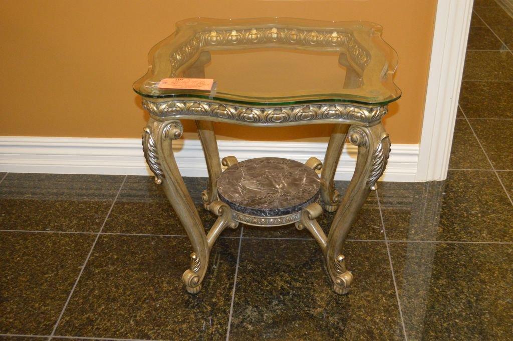 PAIR OF ORNATE GILT END TABLES WITH GLASS TOPS,