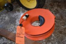 ORANGE EXTENSION CORD REEL, LENGTH UNDETERMINED