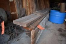 ASSORTED LUMBER ON GARAGE FLOOR, ABOUT 11 PIECES,