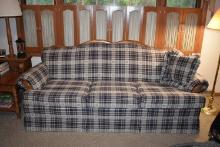 BLUE AND RED PLAID MATERIAL COUCH WITH WOOD TRIM,