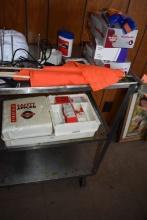 METAL THREE TIER CART WITH CONTENTS; GLOVES, FLAGS,