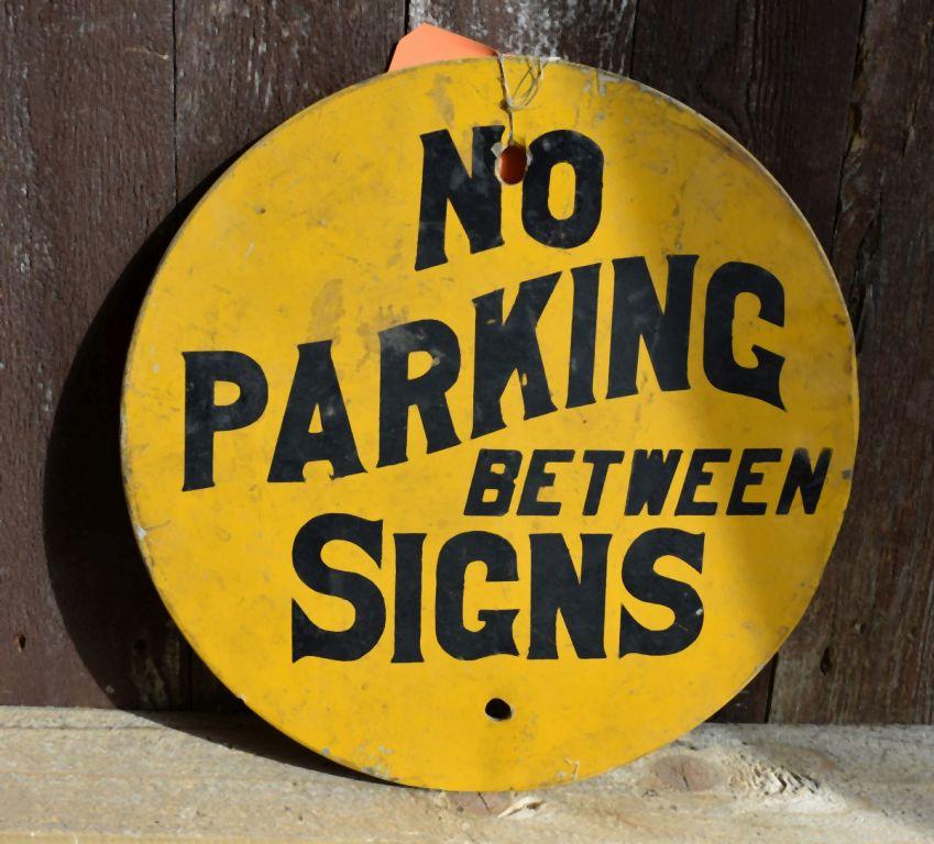 NO PARKING BETWEEN SIGNS ROUND METAL SIGN, 12" DIAMETER