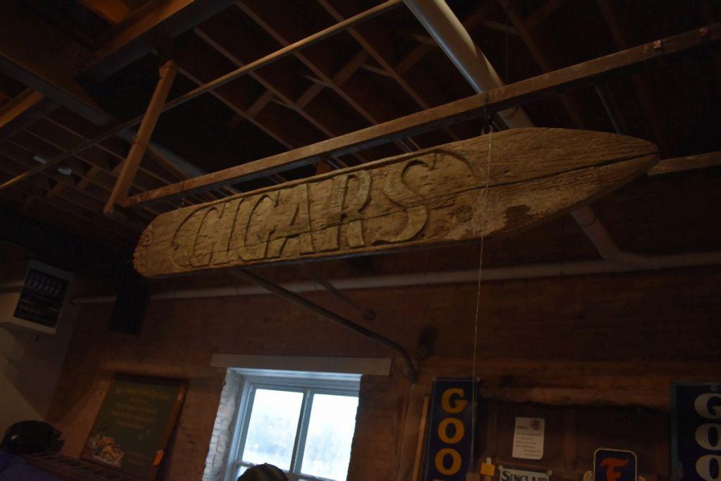 CIGARS SIGN AND LADDER