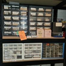 LARGE ASSORTMENT OF HARDWARE ON TWO SHELVES