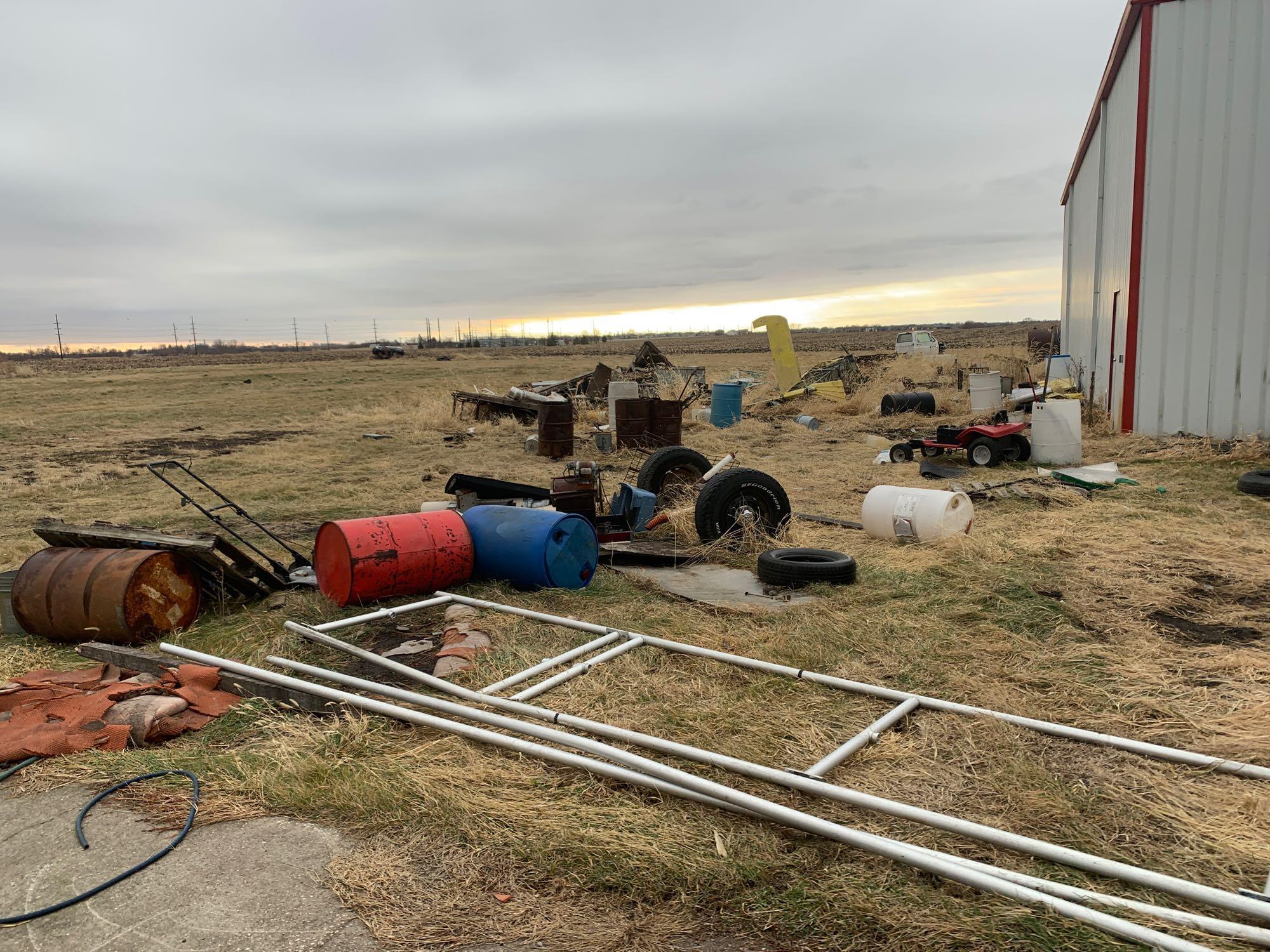 Scrap contents outside of king air building-Including Airplane Items, Cement Roller, no vehicles