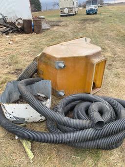 Tires pallets 50 gallon drums tank holders all items on the side of the building