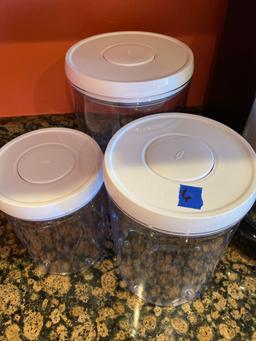 Three Plastic Sealable Canisters