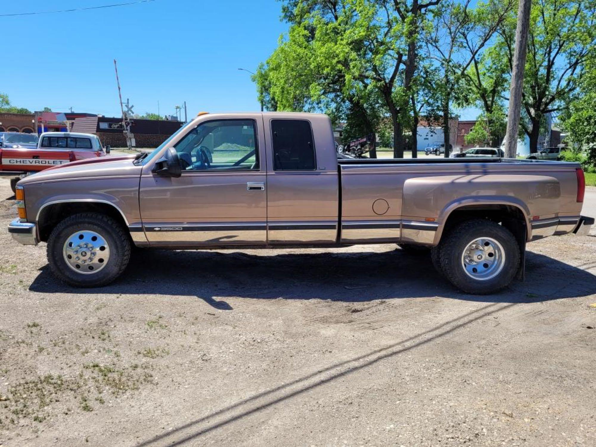 96 chevy ext cab 4x4 5 spd 135 k miles Alcoa wheels