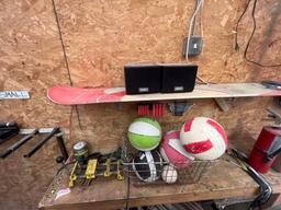 Sony speakers, tools, snow board rack and crate of balls