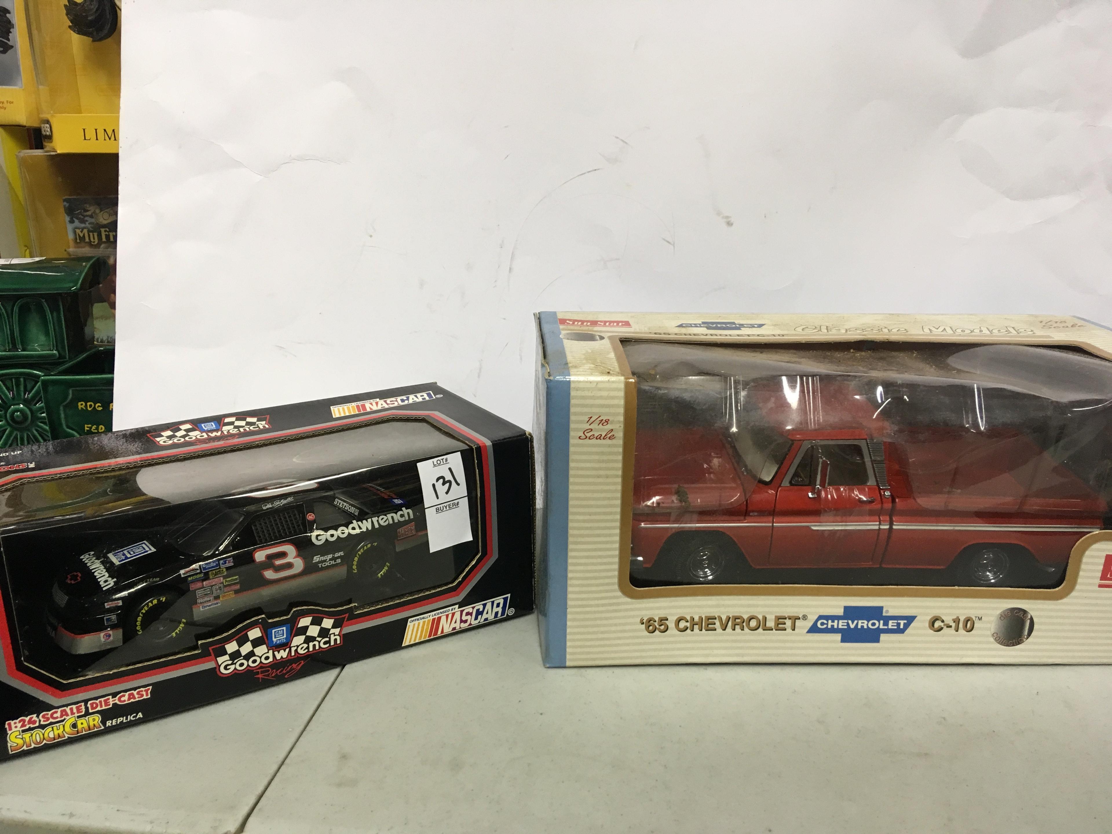 New in box Earnhardt stock car and new in box 1965 Chevrolet C 10 toy truck