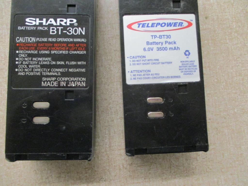 (2) Sharp BT-30 Batteries.