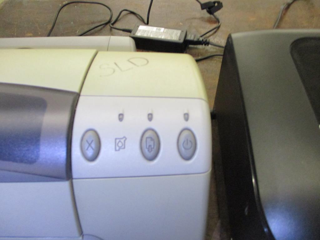 HP Wi-Fi 6100 & DeskJet 970cxi Printers.