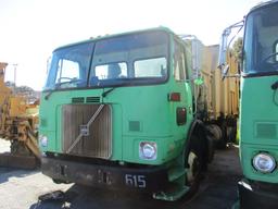 2002 Volvo WXR2 Side Load Garbage Truck.